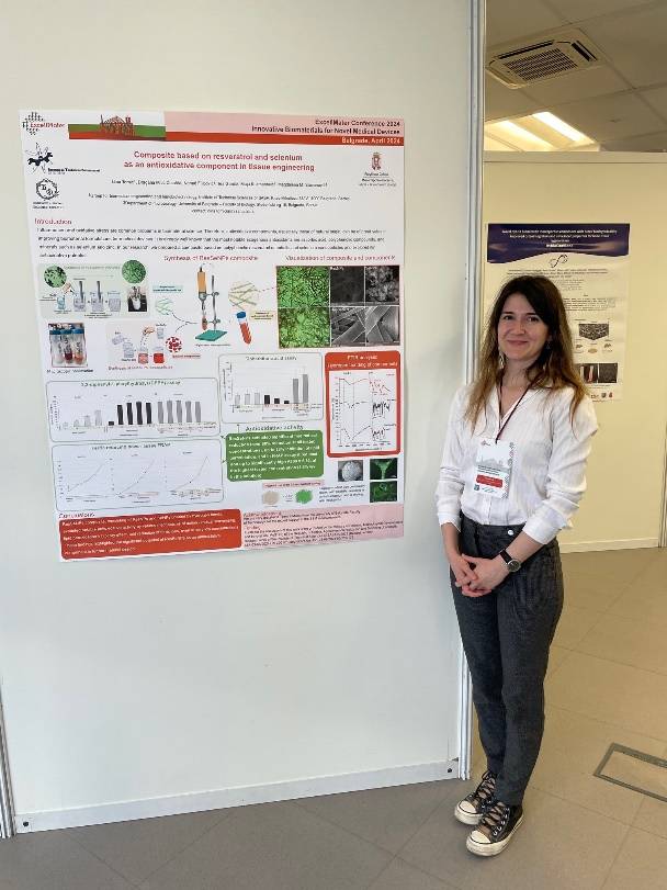 conference participant and her poster