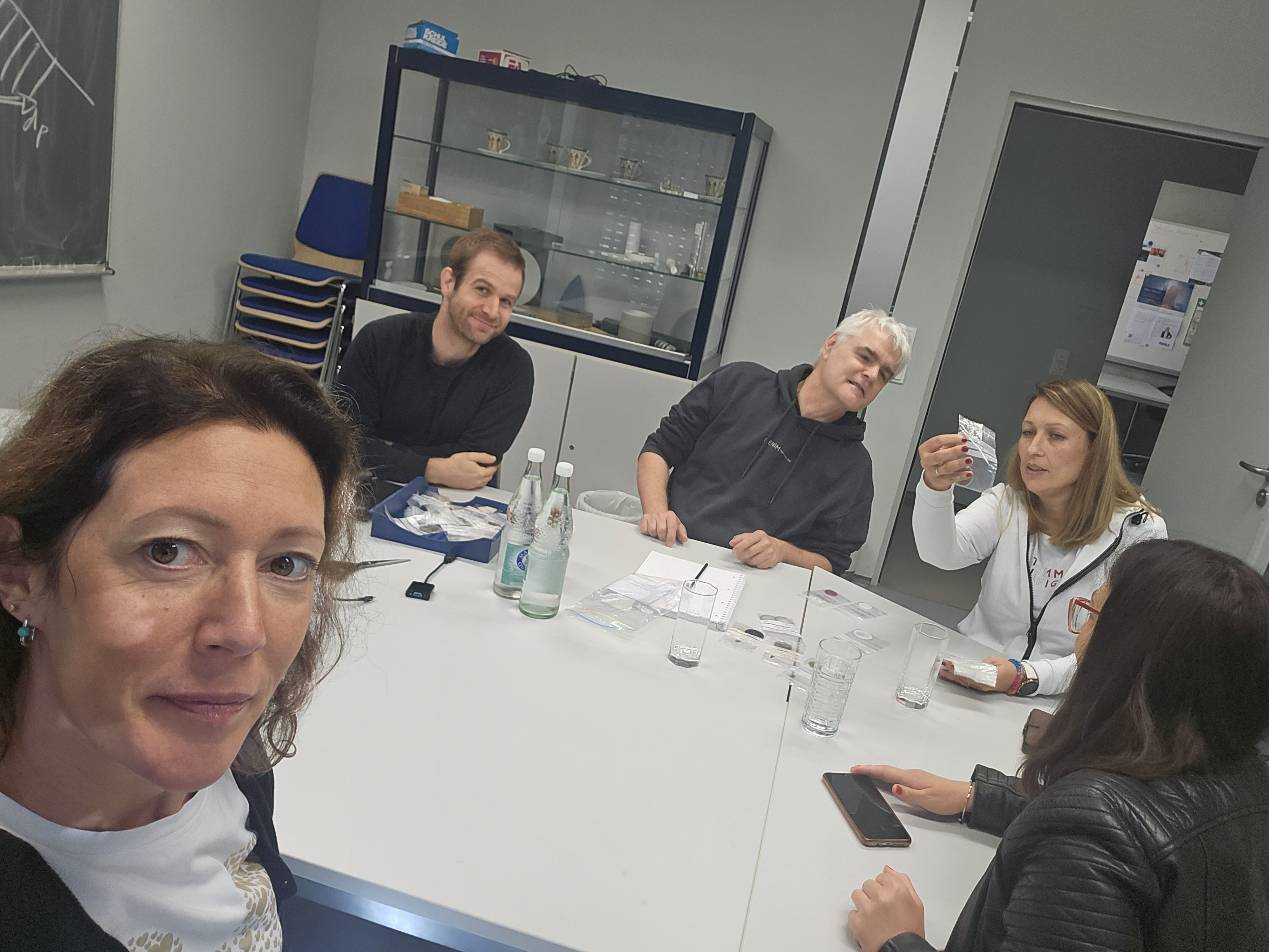 a group of researchers discussing