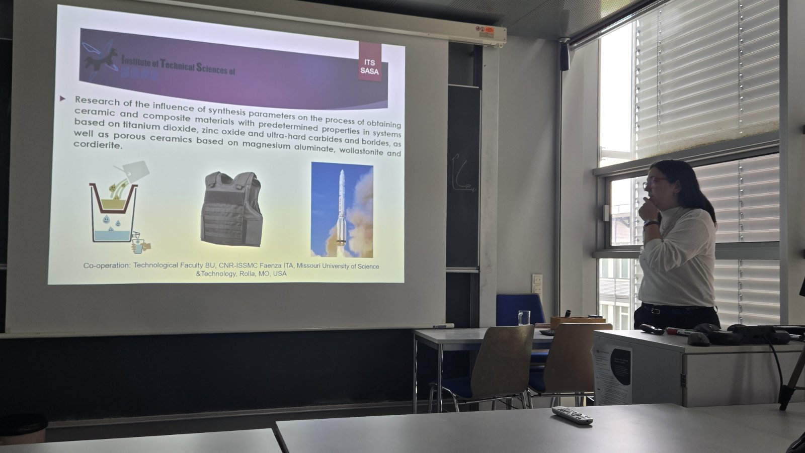 a presenter showing her slides